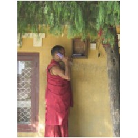 monk on the phone,Katmandu.JPG